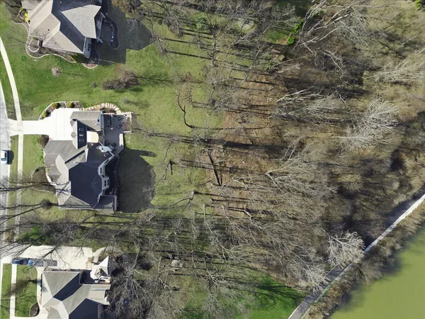 a living room with furniture and stairs