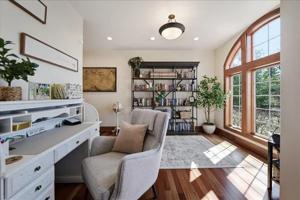a kitchen with a stove and a white cabinets