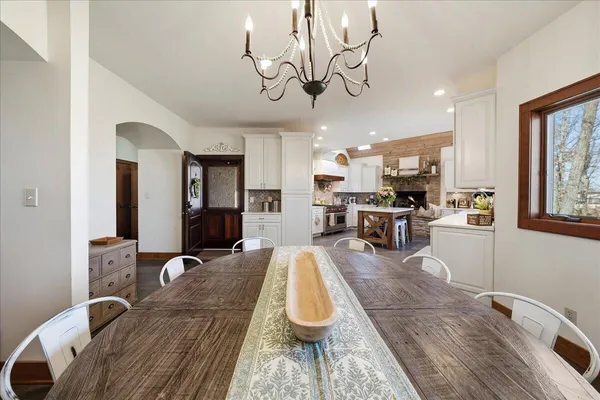 a living room with lots of furniture and a rug