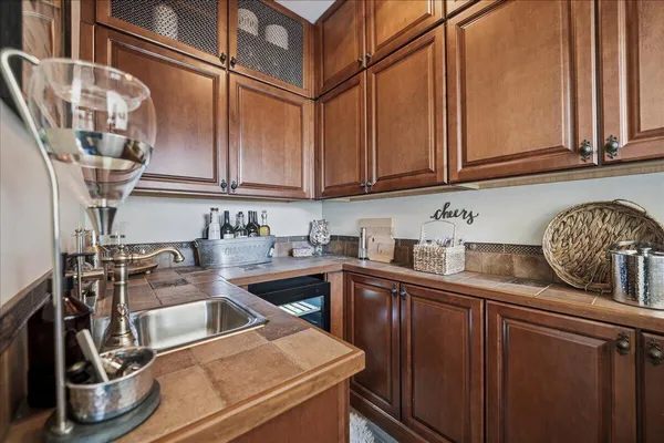 a bathroom with a double vanity sink mirror and double