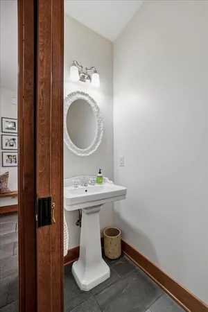 a bedroom with a bed and dresser