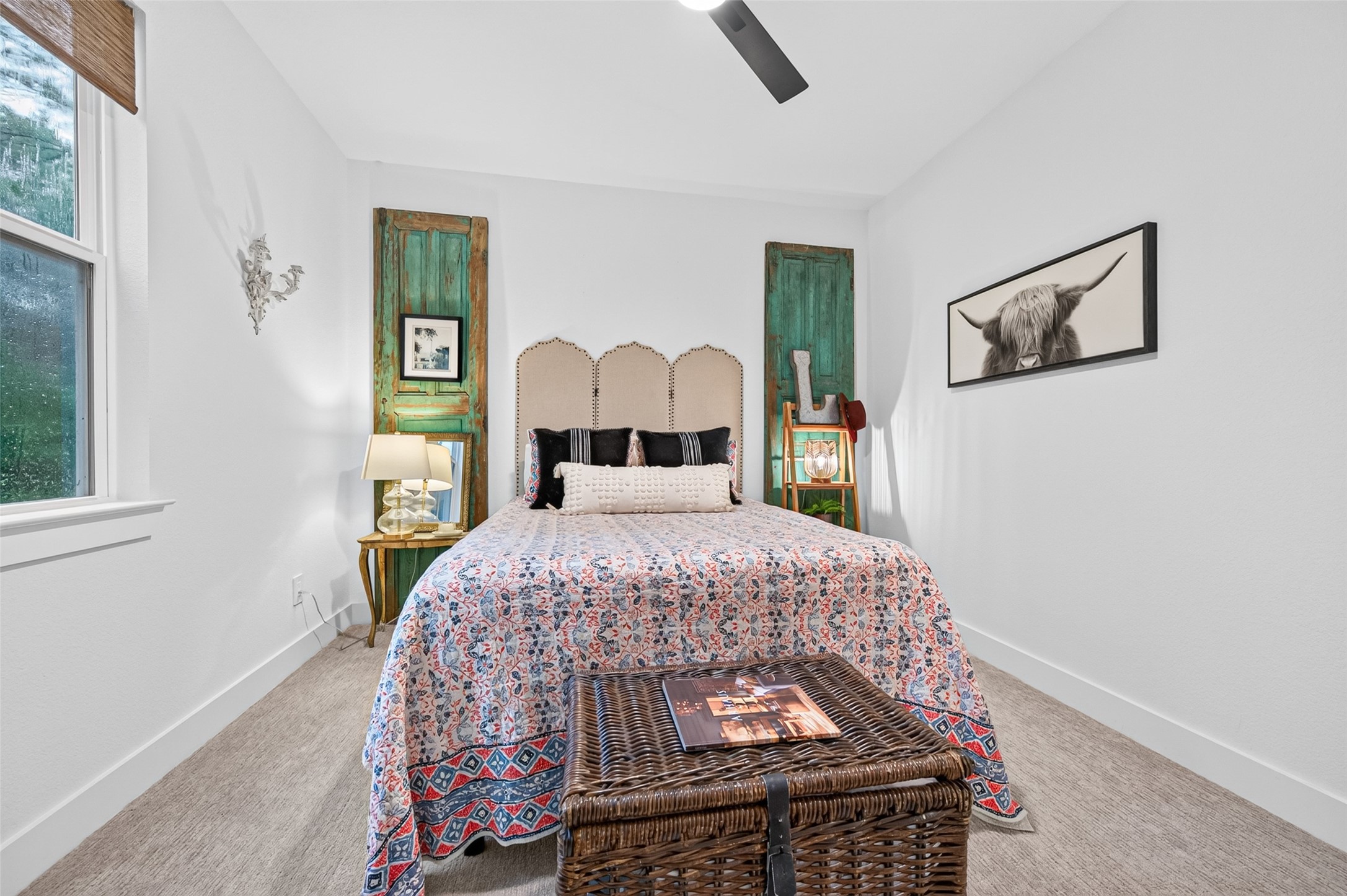 10915 Ruger Road Willis, TX 77378 - Photo 28 of 50 a bedroom with a bed and a window