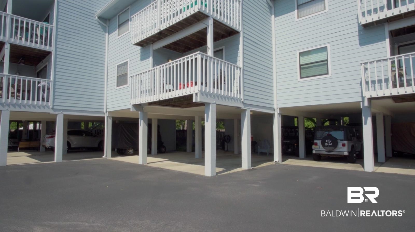 25861 Canal Road, Unit 75 Orange Beach, AL 36561 - Photo 30 of 40 View of home's community featuring a carport