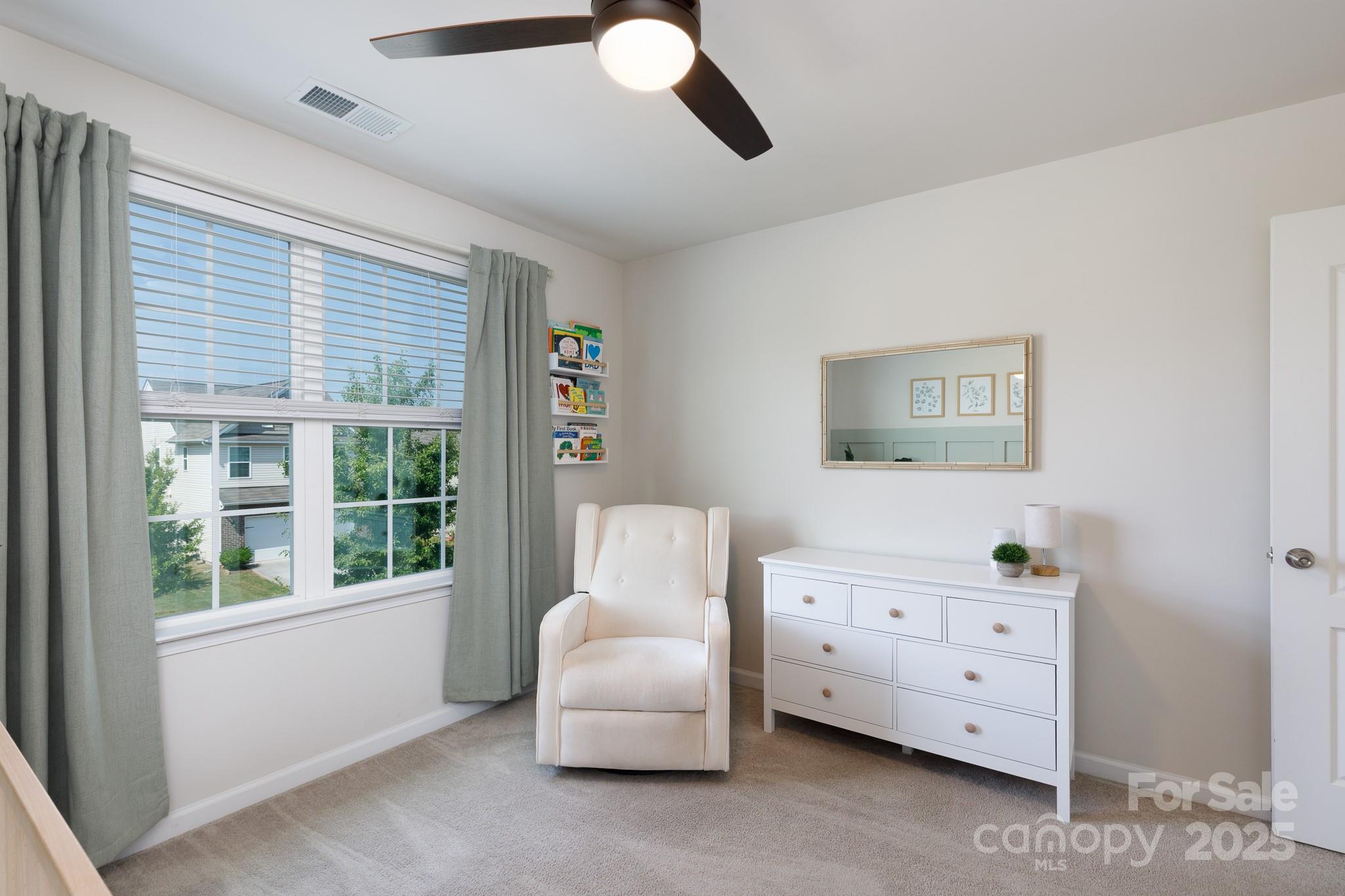 1207 Loggerhead Drive Lancaster, SC 29720 - Photo 14 of 25 a bedroom with furniture and a large window