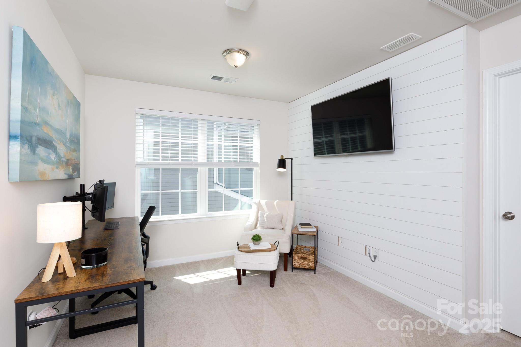 1207 Loggerhead Drive Lancaster, SC 29720 - Photo 20 of 25 a living room with furniture and a flat screen tv