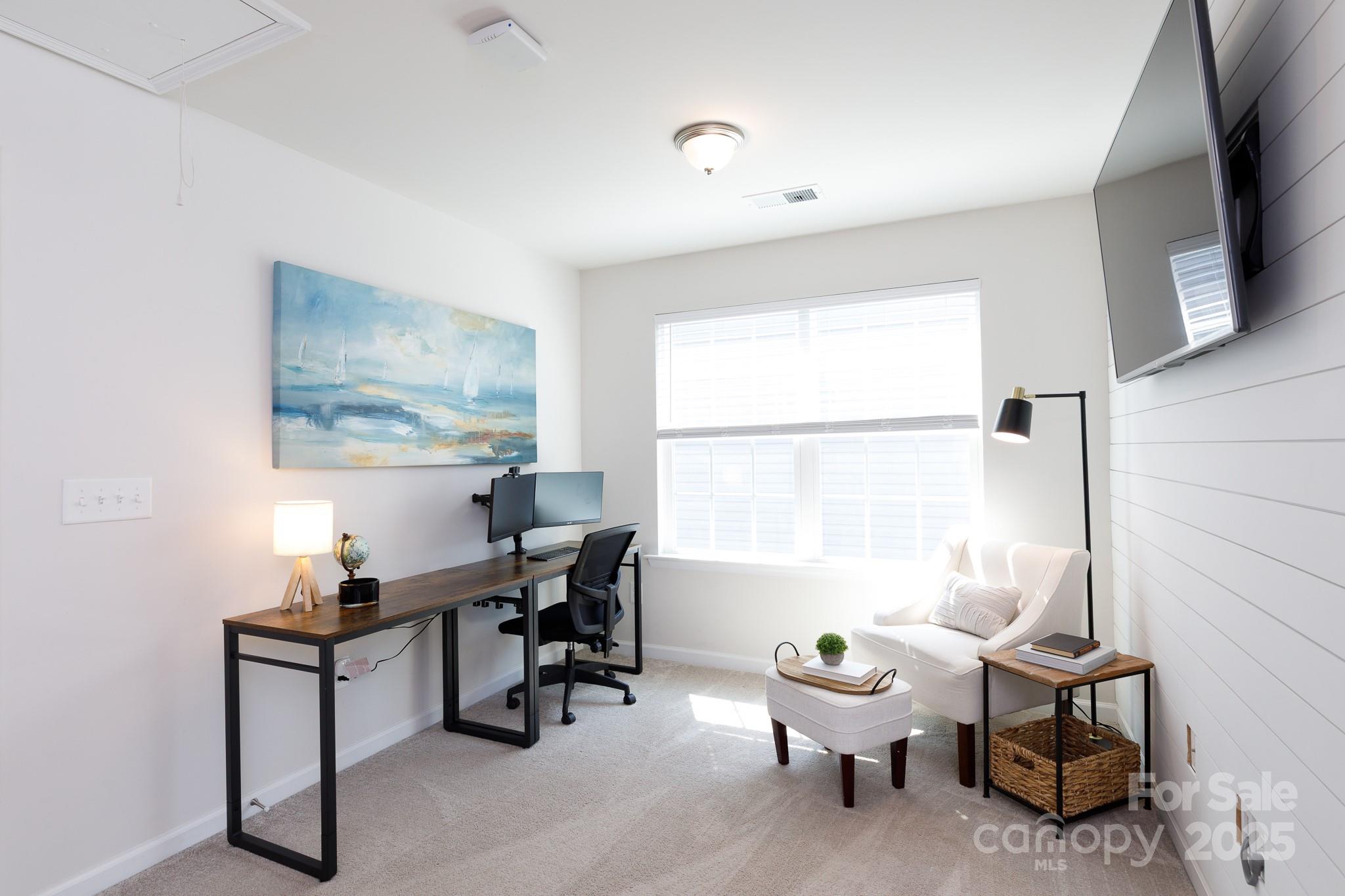 1207 Loggerhead Drive Lancaster, SC 29720 - Photo 21 of 25 a view of a workspace with furniture and a window