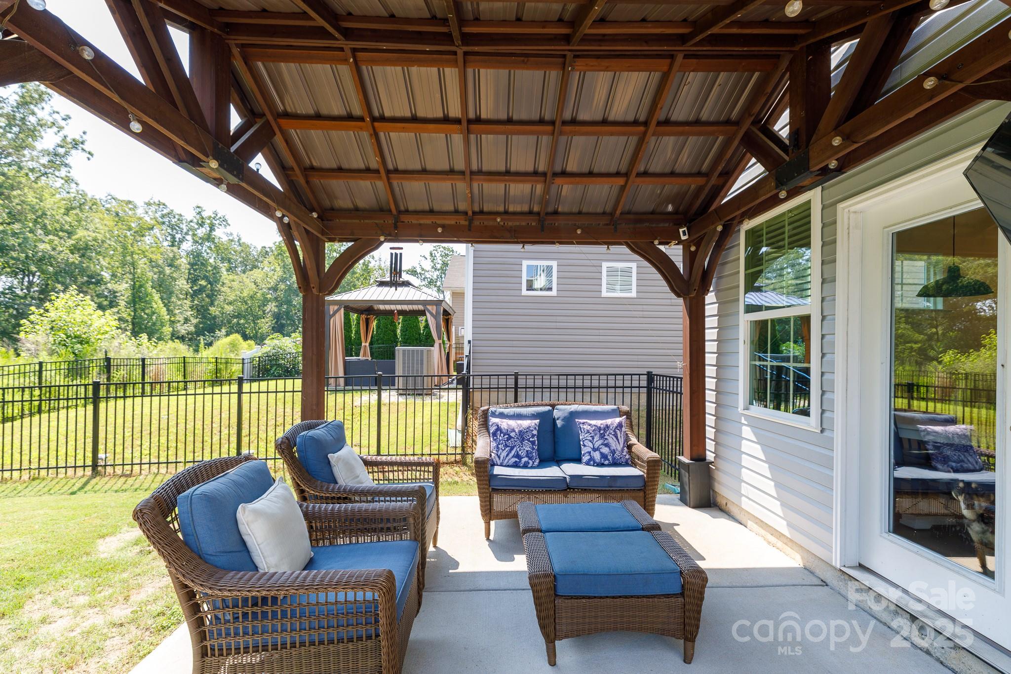 1207 Loggerhead Drive Lancaster, SC 29720 - Photo 24 of 25 a outdoor living space with furniture and garden view