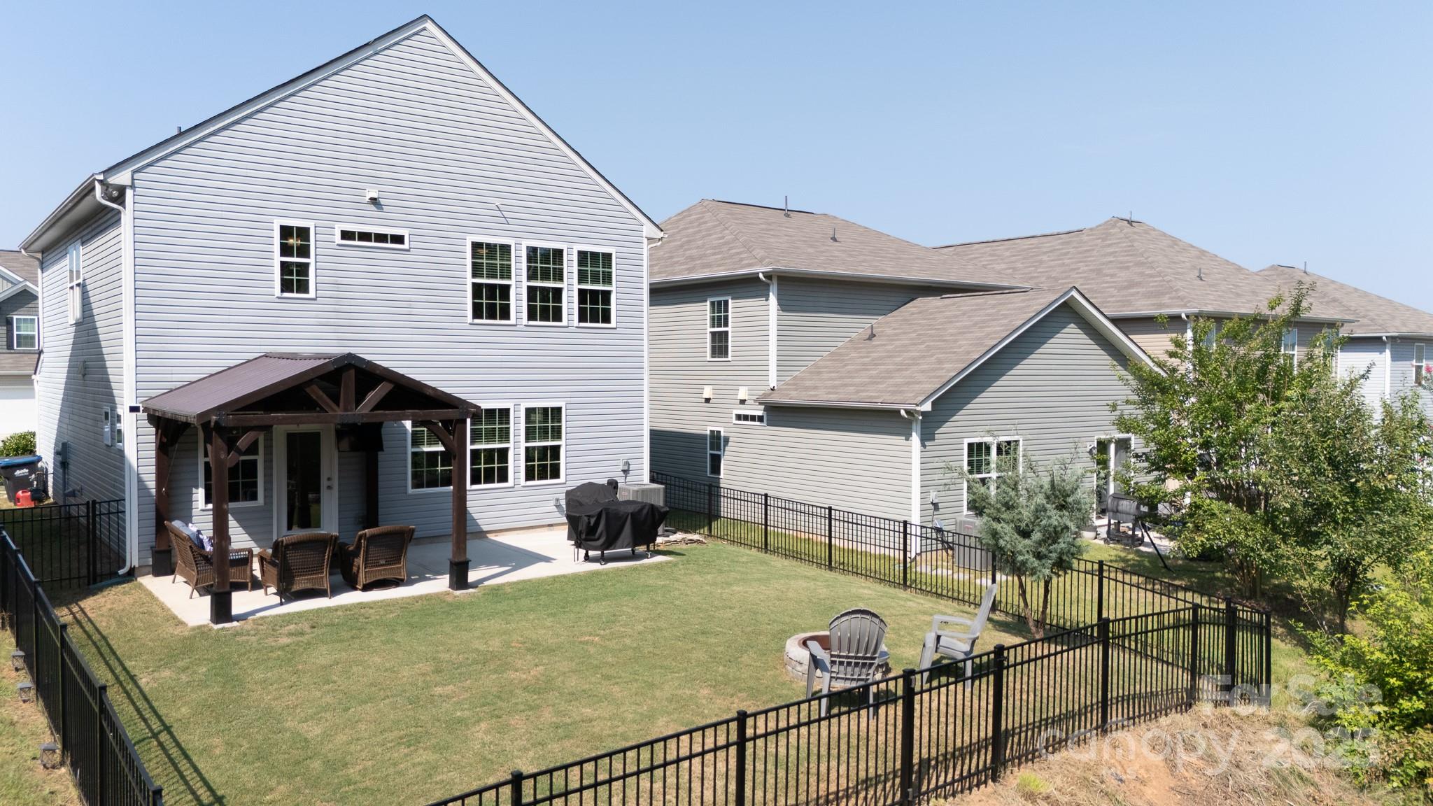 1207 Loggerhead Drive Lancaster, SC 29720 - Photo 25 of 25 a view of a house with backyard and porch