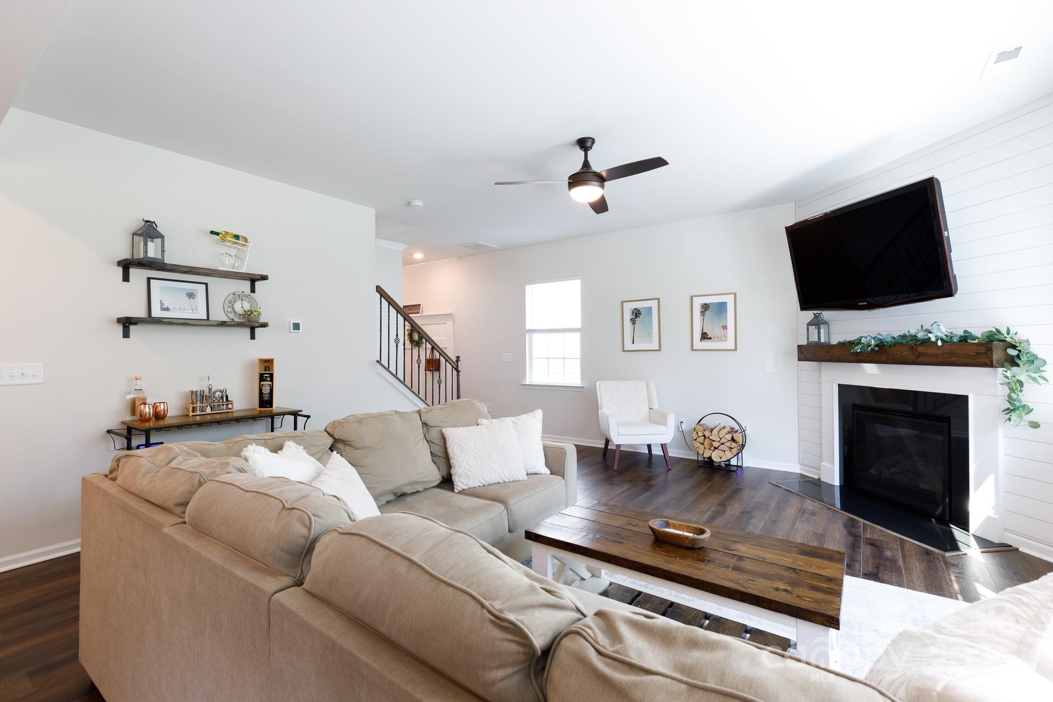 1207 Loggerhead Drive Lancaster, SC 29720 - Photo 4 of 25 a living room with furniture and a fireplace