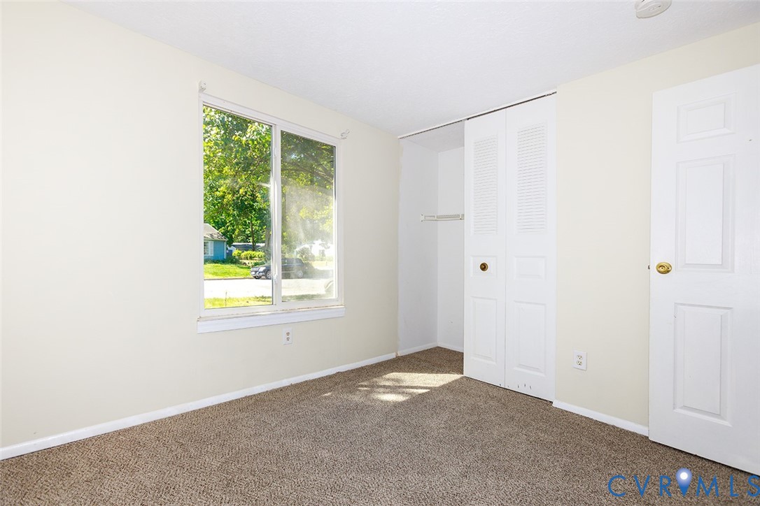 925 Fluvanna Road Newport News, VA 23601 - Photo 17 of 25 a view of a livingroom with a window