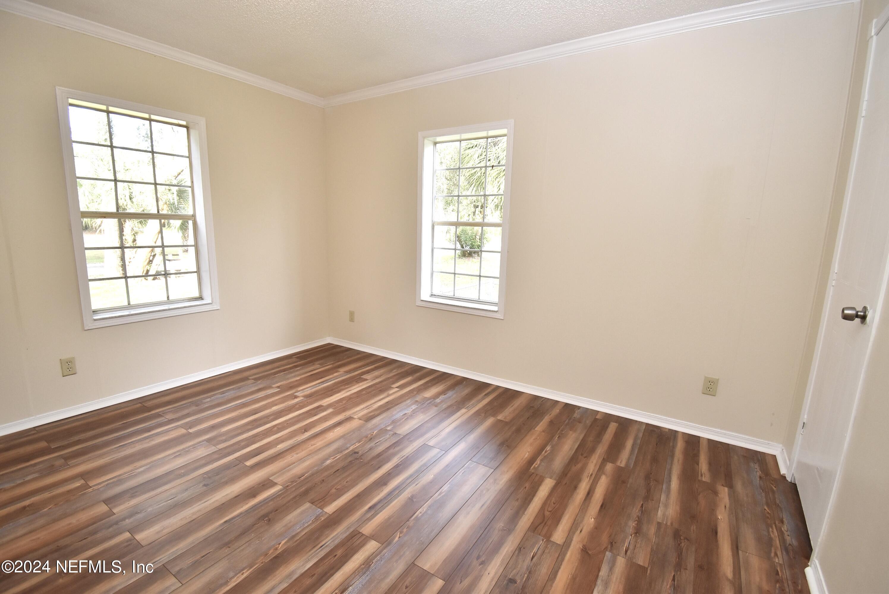 989 Shell Street Welaka, FL 32193 - Photo 32 of 34 an empty room with window