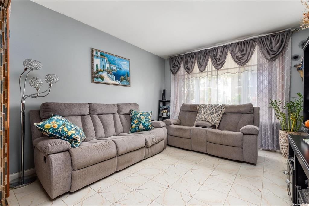 1772 68th Street Brooklyn, NY 11204 - Photo 2 of 34 Living room with light marble finish flooring