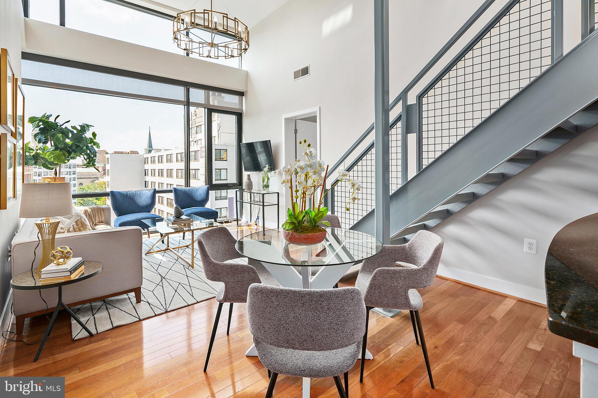 1211 13th Street Northwest, Unit 803 Washington, DC 20005 - Photo 6 of 29 a view of a dining room with furniture window and outside view