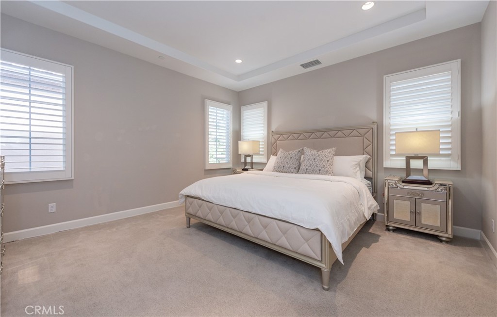 60 Trotter Irvine, CA 92602 - Photo 13 of 24 a bedroom with a bed and a couch