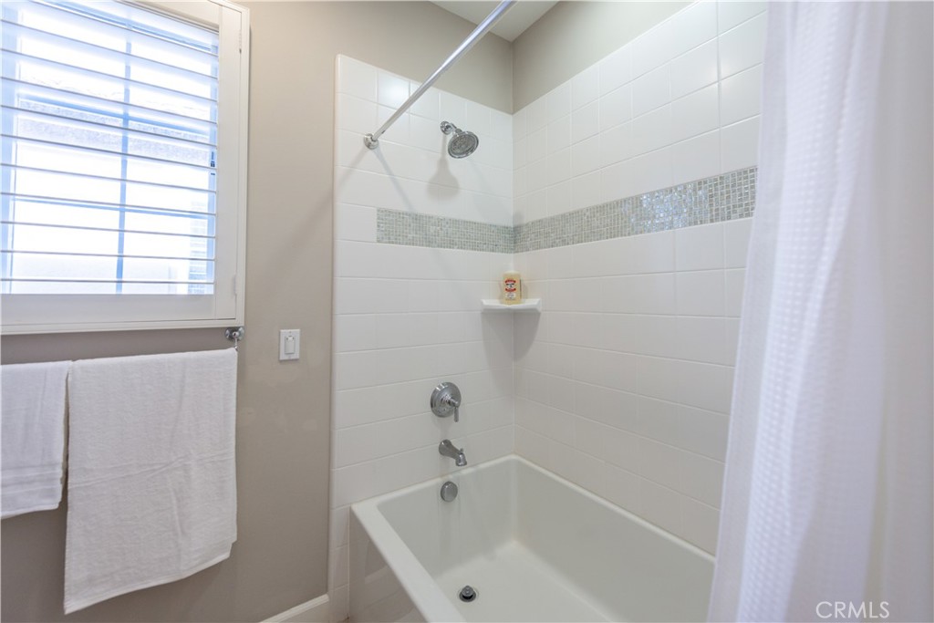 60 Trotter Irvine, CA 92602 - Photo 23 of 24 a white bath tub sitting next to a white sink