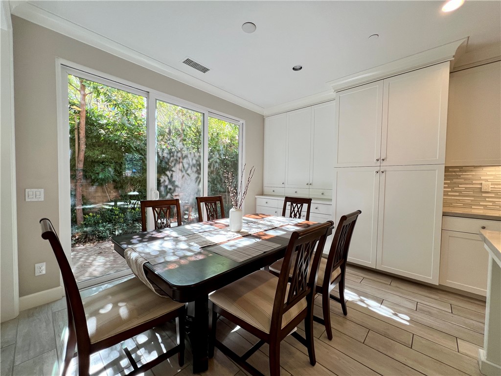 60 Trotter Irvine, CA 92602 - Photo 9 of 24 a view of a dining room with furniture window and outside view