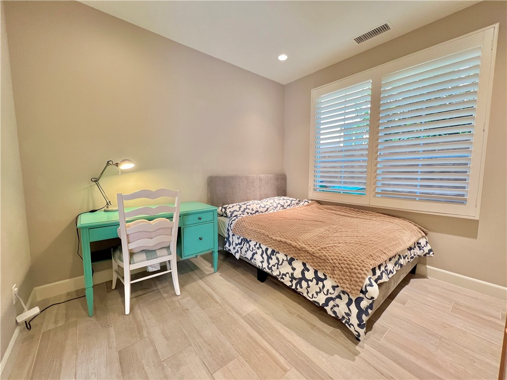 60 Trotter Irvine, CA 92602 - Photo 10 of 24 a bedroom with a bed chair and window