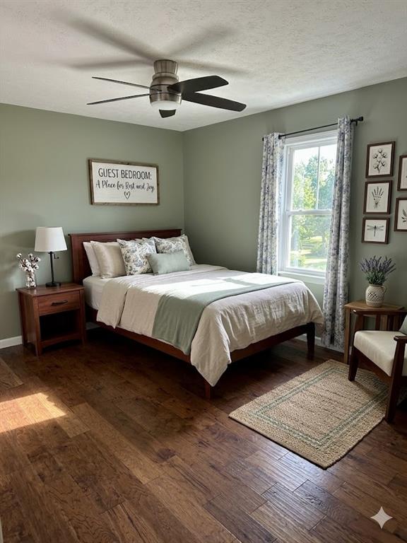 27 Carriage Trace Southeast Cartersville, GA 30121 - Photo 20 of 26 a bedroom with a bed and wooden floor