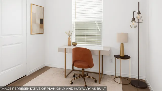 a view of a room with gym equipment and windows