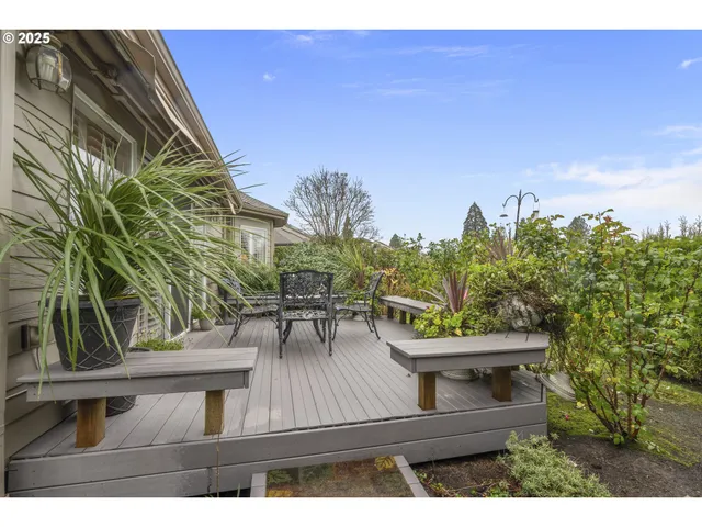 a view of a balcony with chairs
