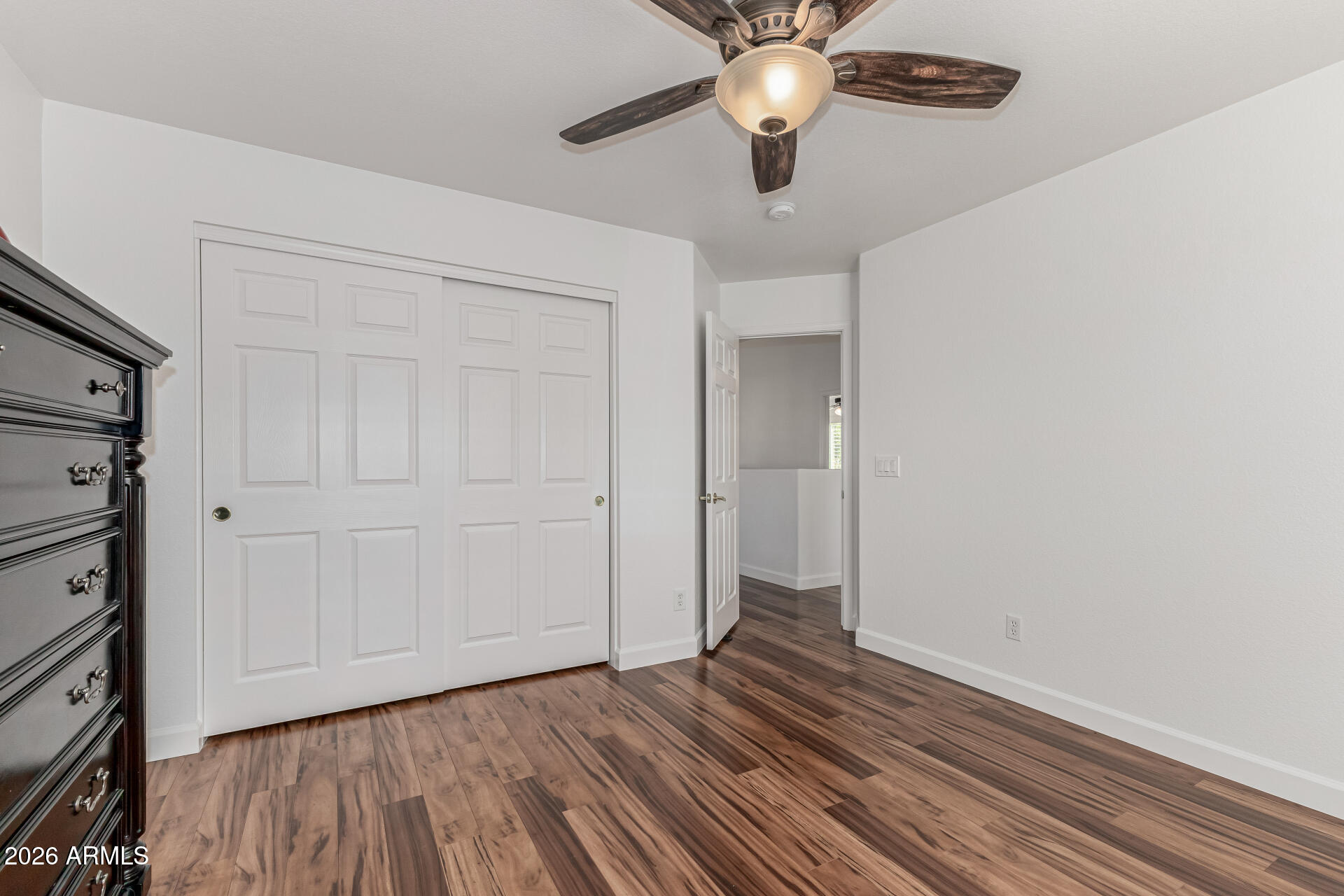 1099 South Justine Court Gilbert, AZ 85296 - Photo 29 of 60 wooden floor in an empty room with a window