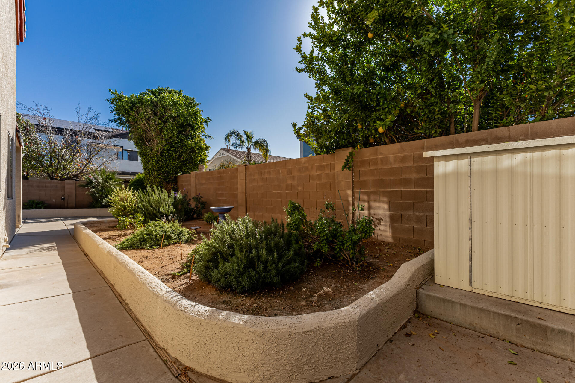 1099 South Justine Court Gilbert, AZ 85296 - Photo 43 of 60 a view of a tub in front of a house