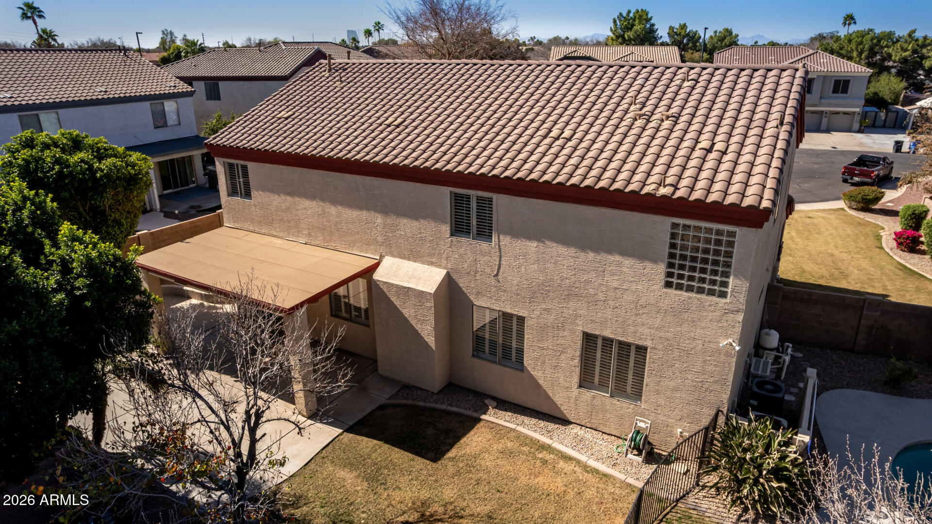 1099 South Justine Court Gilbert, AZ 85296 - Photo 50 of 60 a front view of a house with a garage