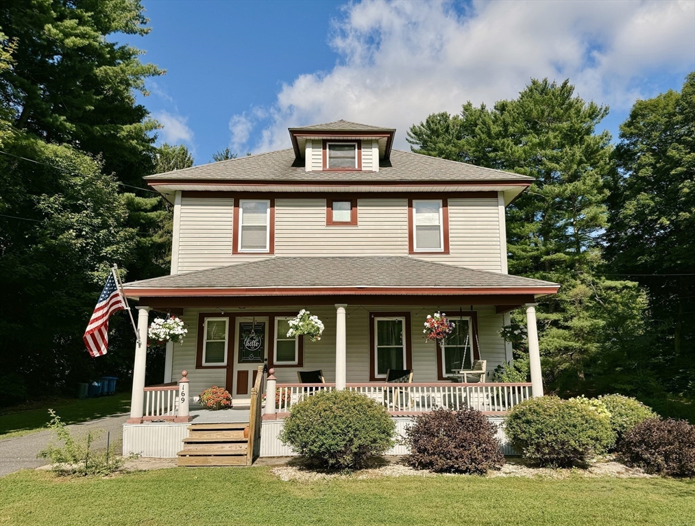 169 Palmer Road Monson, MA 01057 - Photo 1 of 33 a front view of a house with garden