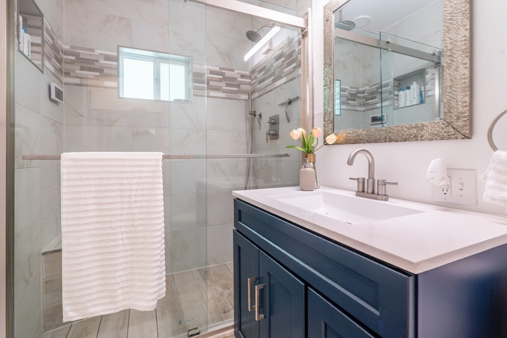 169 Palmer Road Monson, MA 01057 - Photo 20 of 33 a bathroom with a sink and a mirror