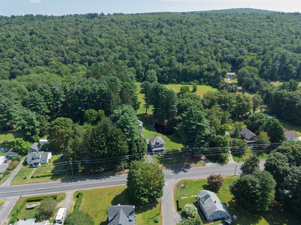 169 Palmer Road Monson, MA 01057 - Photo 29 of 33 an aerial view of a house with a swimming pool