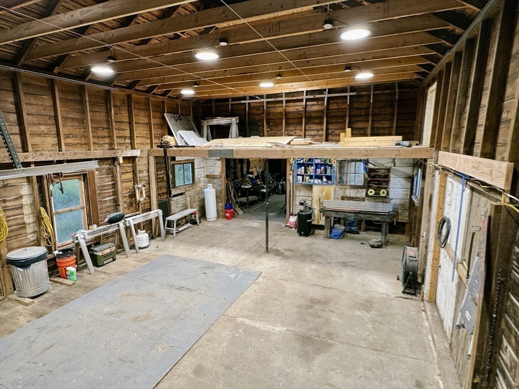 169 Palmer Road Monson, MA 01057 - Photo 5 of 33 a view of a storage room with furniture