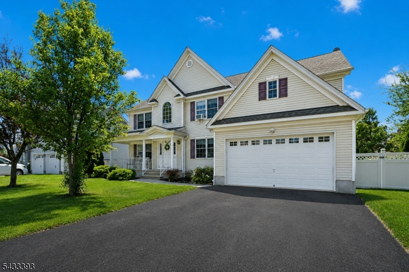 33 Stanton Street Clark, NJ 07066 - Photo 1 of 37 a front view of house with yard and green space
