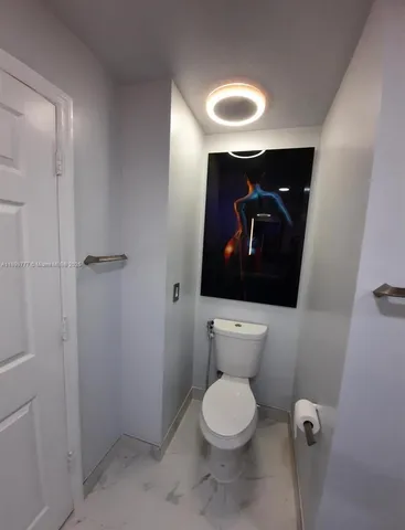 a bathroom with a double vanity sink and mirror