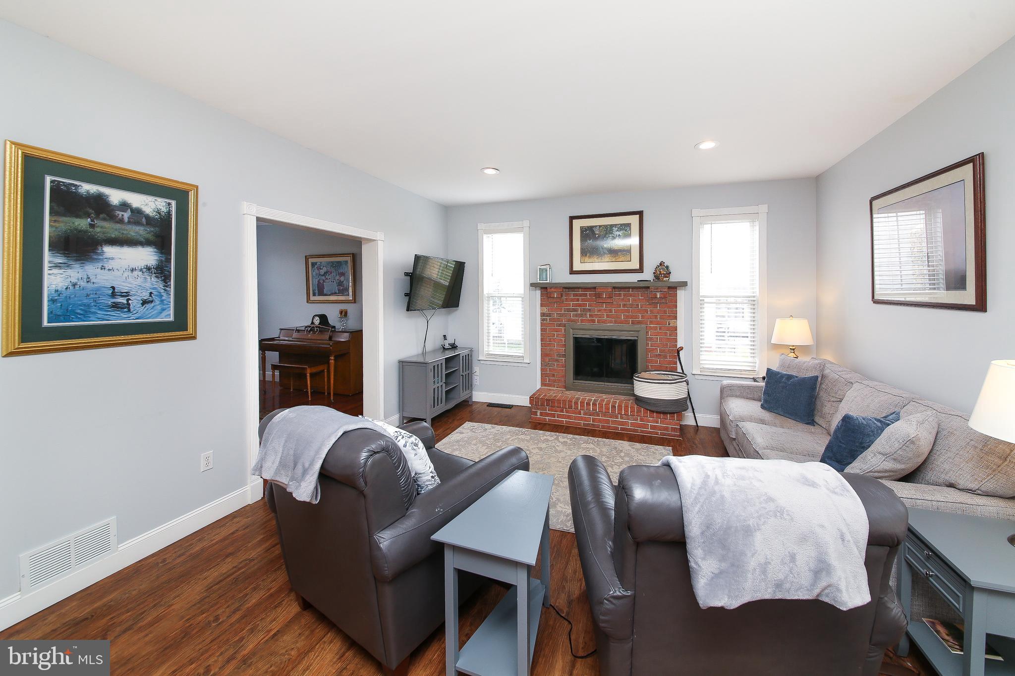 2640 Line Lexington Road Hatfield, PA 19440 - Photo 11 of 30 Cozy family room brick fireplace