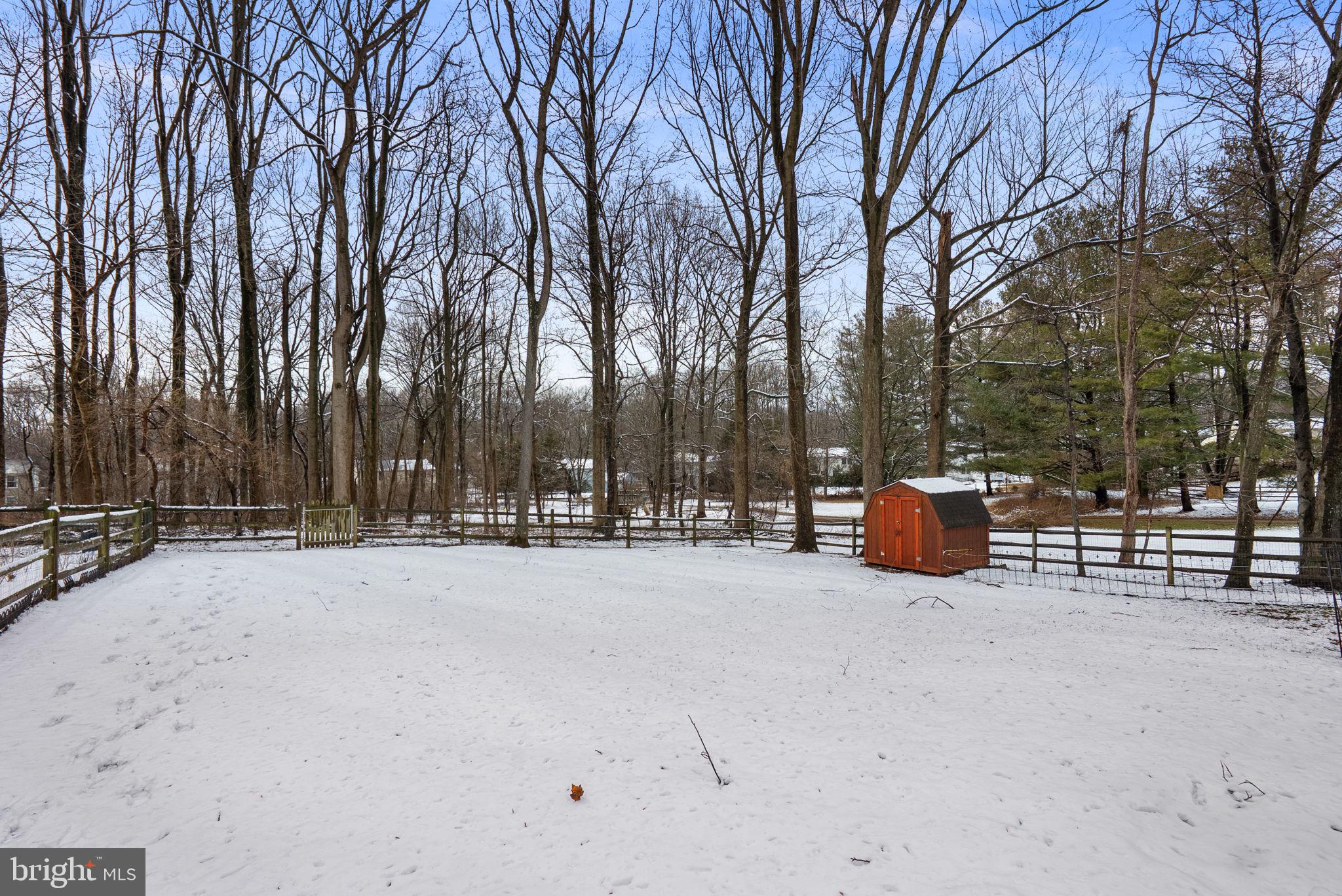 9413 Sunfall Court Columbia, MD 21046 - Photo 62 of 71 a view of outdoor space with patio and wooden fence