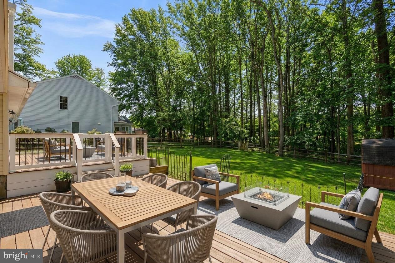 9413 Sunfall Court Columbia, MD 21046 - Photo 66 of 71 a view of a patio with table and chairs couches and pool