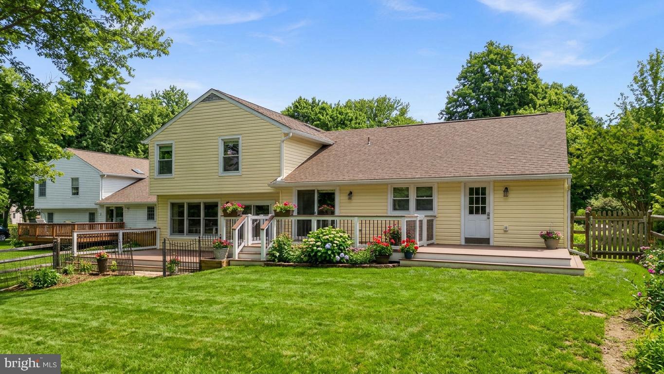 9413 Sunfall Court Columbia, MD 21046 - Photo 67 of 71 a view of a house with a yard porch and sitting area