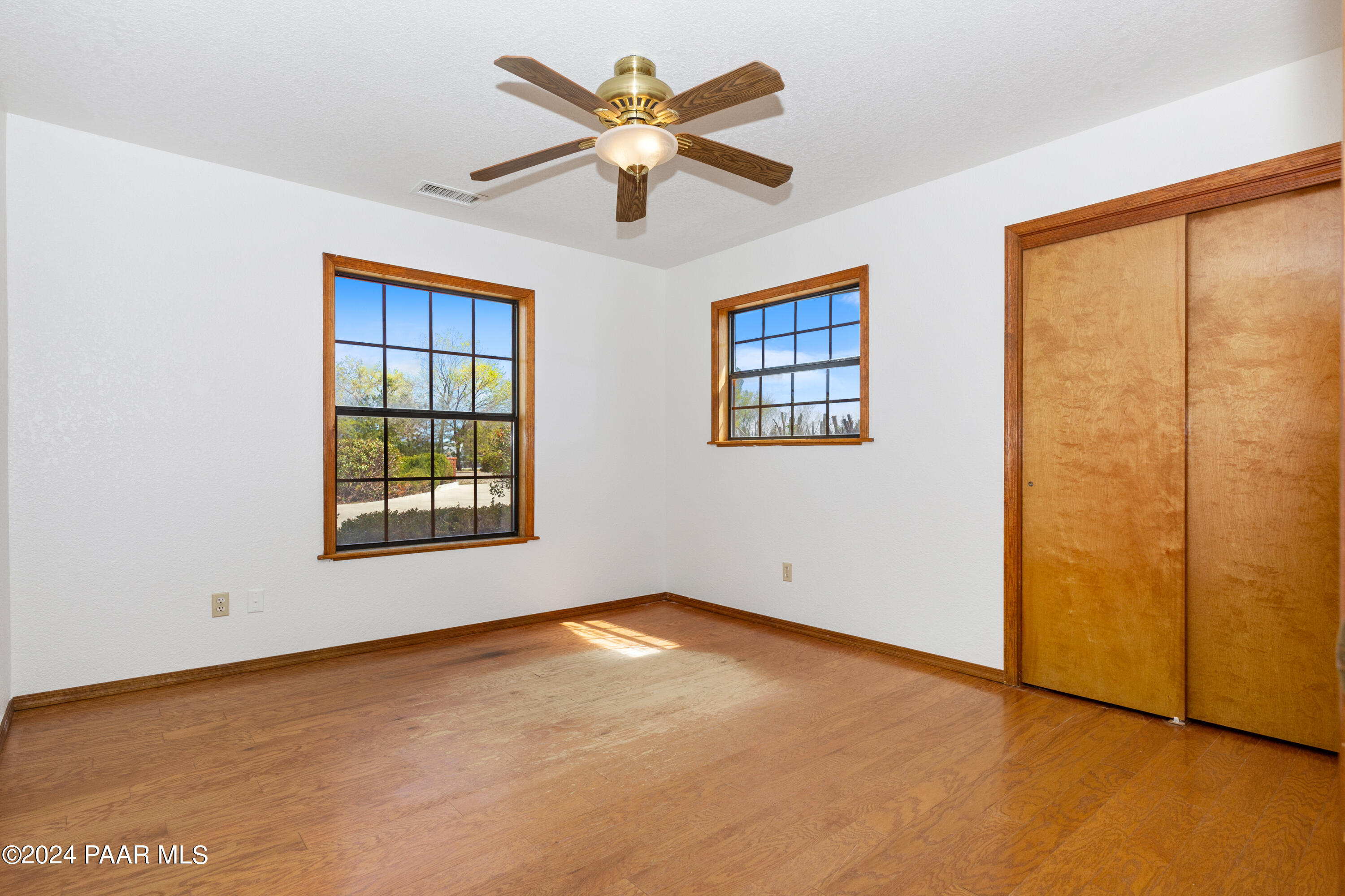 2170 Val Vista Drive Chino Valley, AZ 86323 - Photo 14 of 33 an empty room with windows and closet