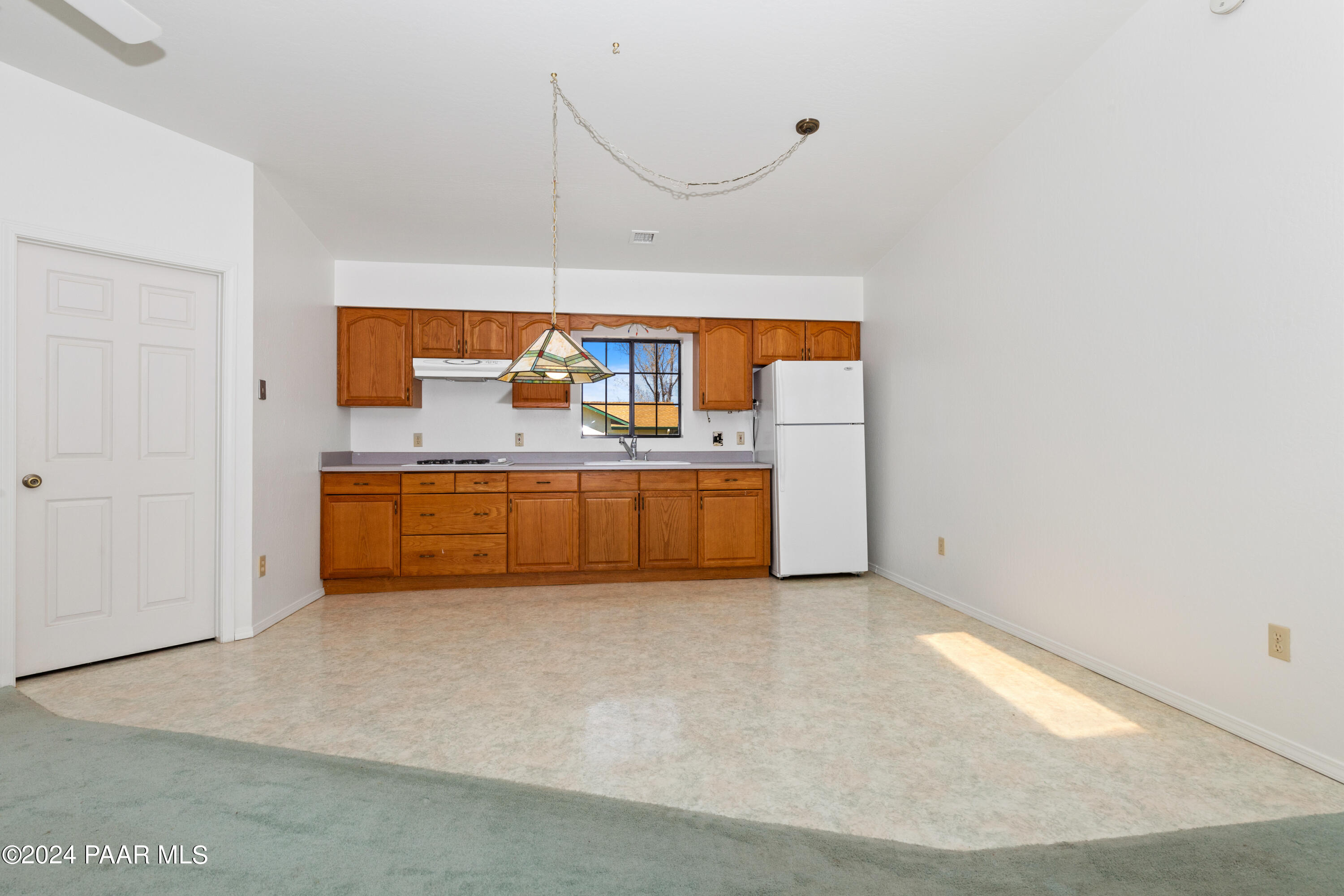 2170 Val Vista Drive Chino Valley, AZ 86323 - Photo 23 of 33 a view of a kitchen with a sink and cabinets