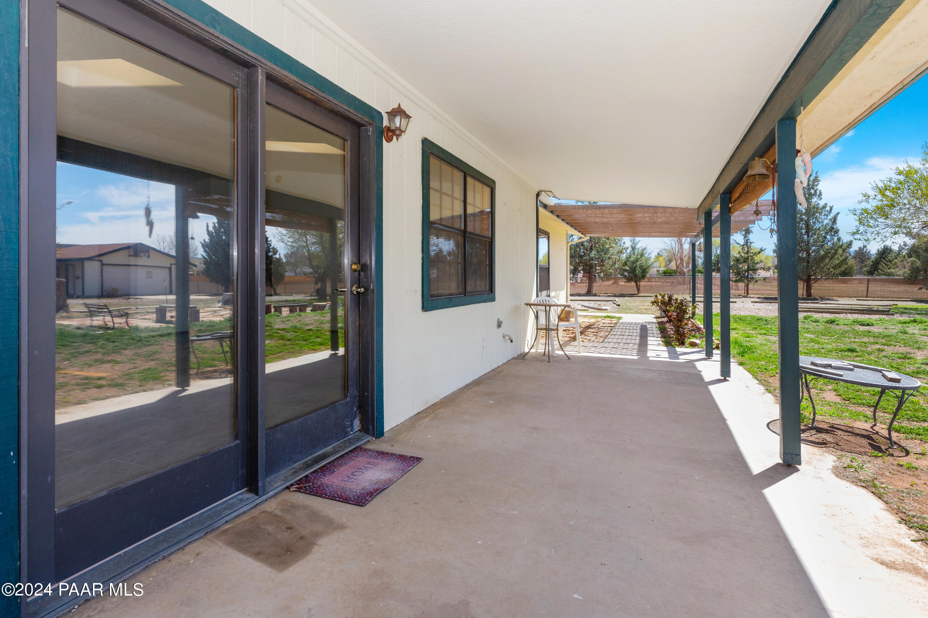 2170 Val Vista Drive Chino Valley, AZ 86323 - Photo 26 of 33 a view of a porch with furniture and garden