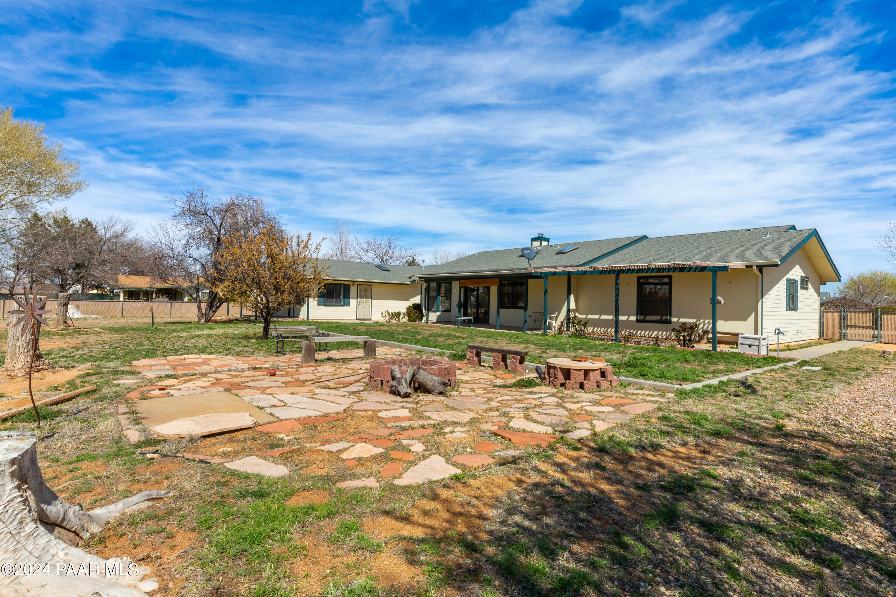 2170 Val Vista Drive Chino Valley, AZ 86323 - Photo 27 of 33 a front view of a house with a yard