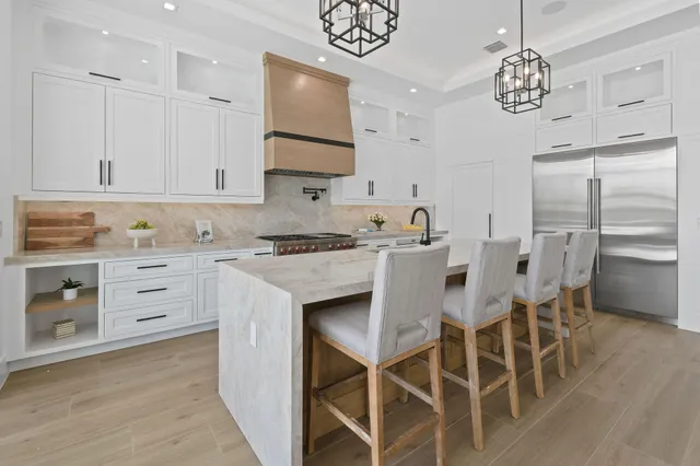 a bed room with a bed and a night stand