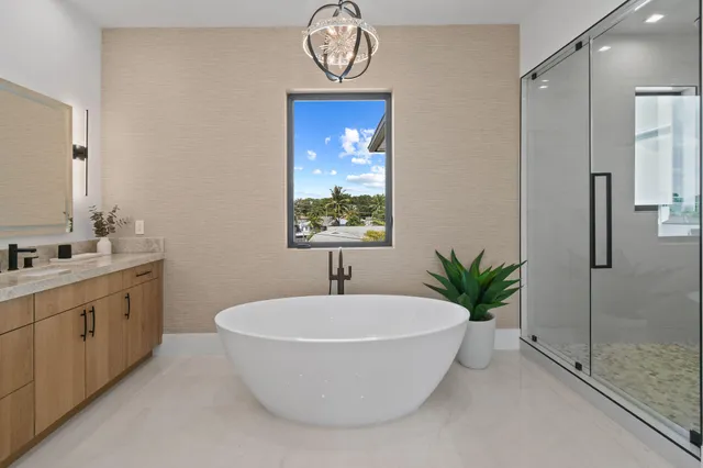 a view of washer and dryer with kitchen in the background