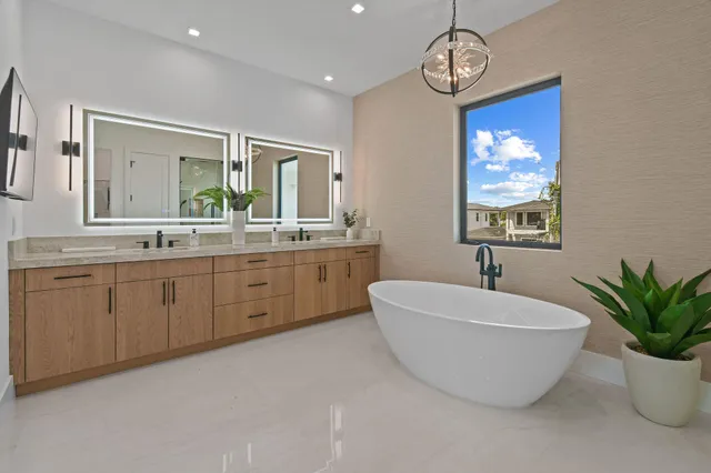 a view of a patio with couches chairs dining table and chairs with wooden floor