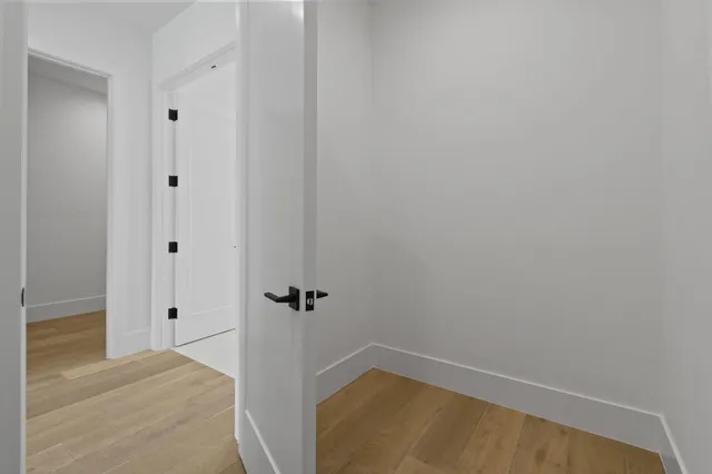 a view of a lake with a house in the background