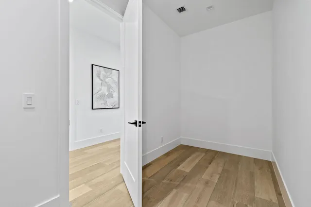 a view of a patio with a table and chairs