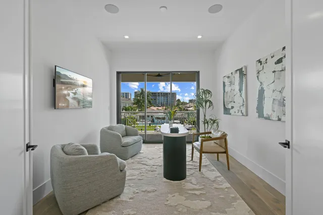 a view of swimming pool with a patio