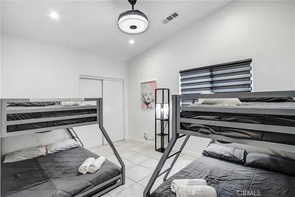 a kitchen with a table and chairs