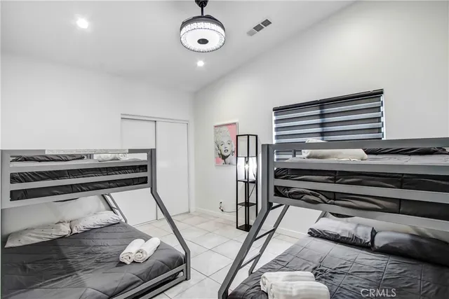 a kitchen with a table and chairs