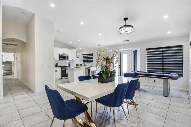 a view of a dining room with furniture
